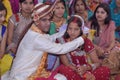 According to the old customs, a young man and a woman who are going to be tied in marriageIn this photo, the groom is wearing a ma