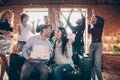 Photo of group amazing friends meeting surprise baby party wedding anniversary future parents sit sofa hold big cake