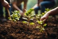 Photo Group of people planting seedlings in a close up scene