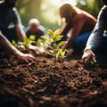 Photo Group of people planting seedlings in a close up scene