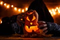 Photo of halloween pumpkin cut in shape of face with witch Royalty Free Stock Photo