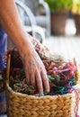 Rustic basket filled with colored wools Royalty Free Stock Photo