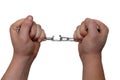 Photo of hands holding a broken chain isolated on a white background Royalty Free Stock Photo