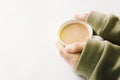 Photo hands holding hot cup of coffee in morning sunlight Royalty Free Stock Photo