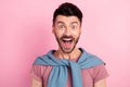 Photo of handsome amazed excited young guy wear casual clothes sale isolated on pastel pink color background