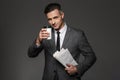Photo of handsome businesslike man dressed in business costume d