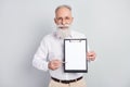 Photo of handsome grey hair old man boss show contract wear spectacles shirt isolated on grey color background