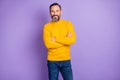 Photo of handsome man happy positive smile confident crossed hands isolated over purple color background