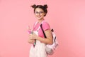 Photo of happy charming girl posing with exercise books and smiling Royalty Free Stock Photo