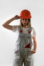 Photo of happy cute smiling good mood female construction worker isolated on white background Royalty Free Stock Photo