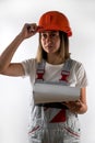 Photo of happy cute smiling good mood female construction worker isolated on white background Royalty Free Stock Photo