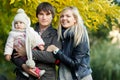 Photo of happy family with daughter outdoors in autumn Royalty Free Stock Photo