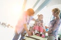 Portrait of happy family going on a holiday in airport