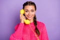 Photo of happy lovely attractive woman hold telephone good mood smile isolated on purple color background Royalty Free Stock Photo