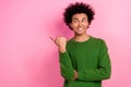 Photo of happy positive guy point finger empty space adverts isolated pastel color background