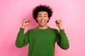 Photo of happy positive guy surprised unexpected victory raise fists up isolated pastel color background