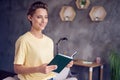 Photo of happy positive pretty nice young woman hold hand novel book smile indoors inside house home apartment