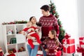 Photo of happy positive husband wife young family smile good mood enjoy holiday indoors in living room apartment Royalty Free Stock Photo