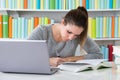 Young Woman Studying In Library Royalty Free Stock Photo