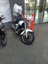 Photo of a Harley motorbike parked at the building