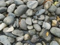 Photo from a high angle of a group of rocks by the river