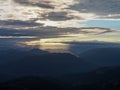 Photo from the highest peak of Pui Ko mountain, Mae Hong Son, Thailand. The sun shines down over the complex mountains in the