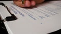 3 photo hispanic male hand filling out writing real estate purchase form Royalty Free Stock Photo