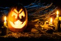 Photo for the holiday Halloween. Evil pumpkin lamp