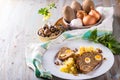 Photo of homemade meatloaf with small quail eggs and other ingredients