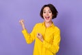 Photo of hooray young lady yell wear yellow shirt isolated on purple color background