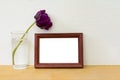 Photo of horizontal wooden frame with copy space and dark purple tulip. Wooden Royalty Free Stock Photo