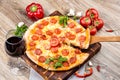 Hot pizza on wooden background