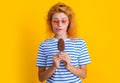 photo of hungry girl with icelolly ice cream at summer. girl with icelolly ice cream