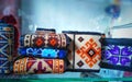 photo of Hunza traditional sewing wallets . Partially blurred background