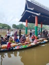 Photo of the iconic floating market selling with shoppers on the Martapura river Banjarmasin, Indonesia