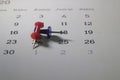 Simple Photo Illustration for Make a Schedule, Calendar Marking with Red and Blue Push Pin Royalty Free Stock Photo