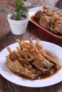 Spicy chicken claw with sauce bumbu rujak Royalty Free Stock Photo