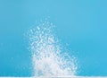 Photo image of explosion dust snow, heavy big small size snows. Freeze shot on blue sky winter background isolated overlay. Fluffy Royalty Free Stock Photo