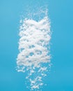 Photo image of falling down snow, heavy big small size snows. Freeze shot on blue sky winter background isolated overlay. Fluffy Royalty Free Stock Photo