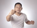 Angry Asian Man Expression Ready to Fight Royalty Free Stock Photo