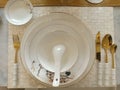 a photo or image of a plate, cutlery and knife