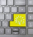yellow lightbulb energy power symbol keyboard key icon button language sign icon arrows greener clean Royalty Free Stock Photo