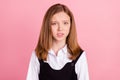 Photo of impressed shocked school girl wear white black uniform listening bad news isolated pink color background