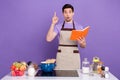 Photo of impressed smart boyfriend dressed chef outfit having tasty breakfast idea isolated purple color background