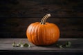 Photo Indoor studio spotlight pumpkin, a symbol of seasonal flavor