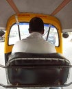 A photo inside of a private public transport called autorickshaw in a city of a India