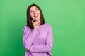 Photo of inspired excited lady look empty space thinking thoughts isolated on green color background