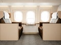 Photo interior of luxury private airplane. Empty leather chair, modern generic design laptop table. Image ready for your