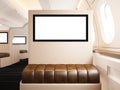 Photo interior of private airplane. Empty leather chair. Blank digital screen ready for your information. Luxury jet