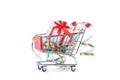 Photo of iron cart with box with gift, ribbons Royalty Free Stock Photo